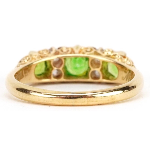 24 - An antique 18ct gold green stone and diamond ring with ornate setting, 1914 inscription, size L/M, 4... 