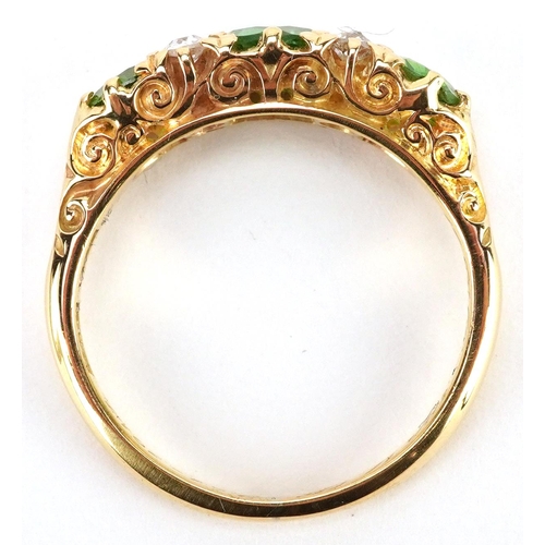 24 - An antique 18ct gold green stone and diamond ring with ornate setting, 1914 inscription, size L/M, 4... 