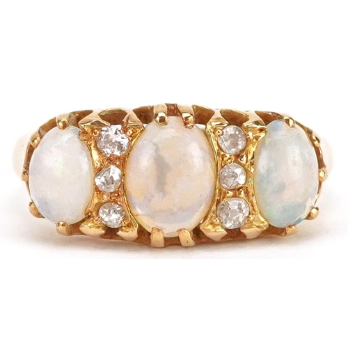 83 - An antique 18ct gold cabochon opal and diamond ring set with six diamonds, size R, 3.4g.