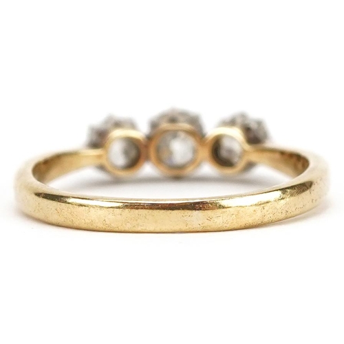 1 - An 18ct gold diamond three stone ring, total diamond weight approximately 0.50 carat, size O, 2.8g.