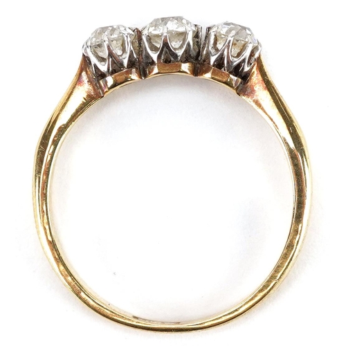 1 - An 18ct gold diamond three stone ring, total diamond weight approximately 0.50 carat, size O, 2.8g.