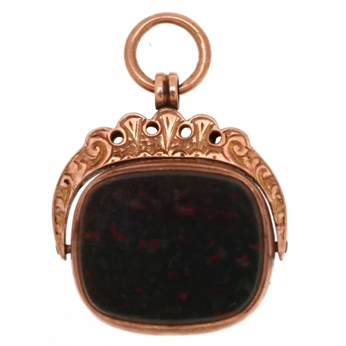 284 - A Victorian 9ct rose gold bloodstone and carnelian spinner fob, Birmingham 1898, 2.2cm high, 4.6g.