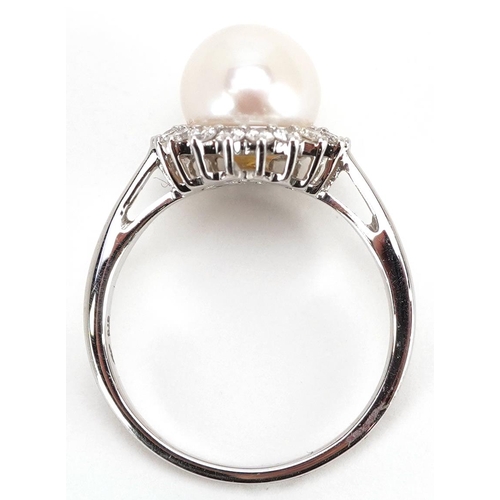 229 - A 9ct white gold cultured pearl and diamond halo ring, total diamond weight approximately 0.37 carat... 