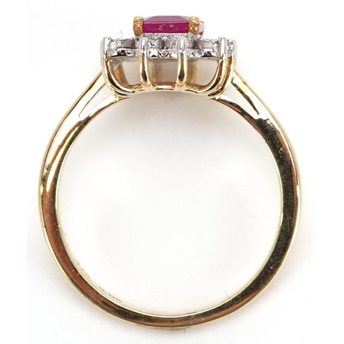 144 - A 9ct gold ruby and diamond cluster ring, total diamond weight approximately 0.06 carat, the ruby ap... 