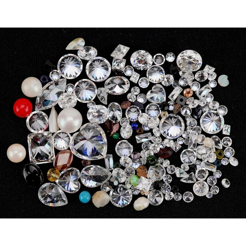 577 - A collection of loose semi precious stones including cubic zirconia, pearls and citrine, total weigh... 