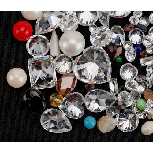 577 - A collection of loose semi precious stones including cubic zirconia, pearls and citrine, total weigh... 