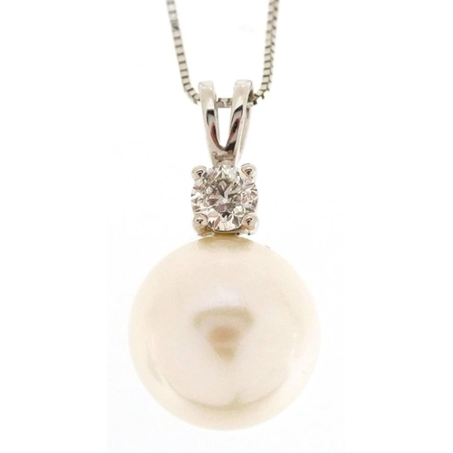 133 - A 9ct white gold cultured pearl and diamond solitaire pendant on a 10ct white gold necklace, the dia... 