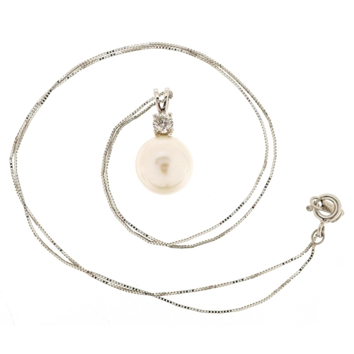 133 - A 9ct white gold cultured pearl and diamond solitaire pendant on a 10ct white gold necklace, the dia... 