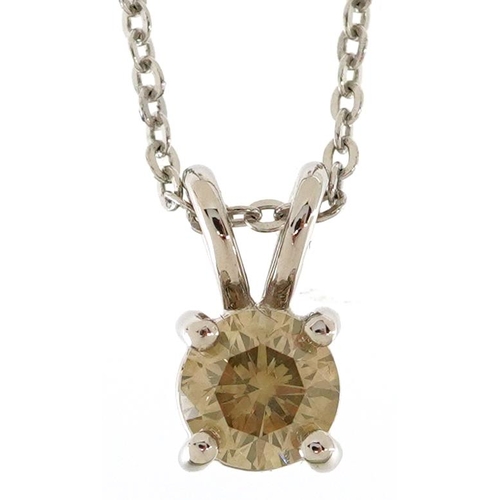 325 - An 18ct white gold yellow diamond solitaire pendant on a silver necklace, the diamond approximately ... 