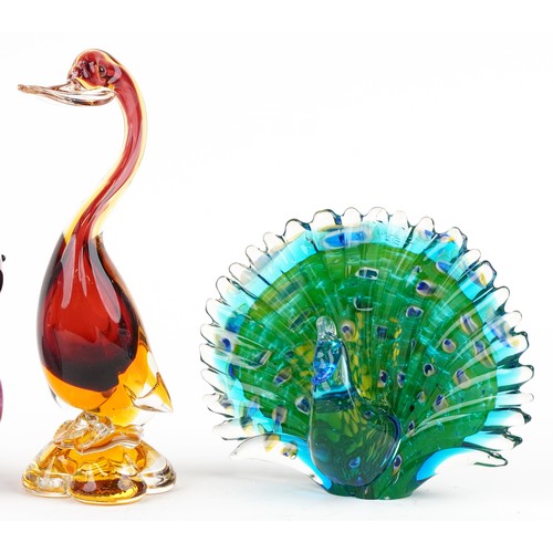 1312 - Three mid/late 20th century coloured glass animal figures including a flamingo, swan and peacock tog... 