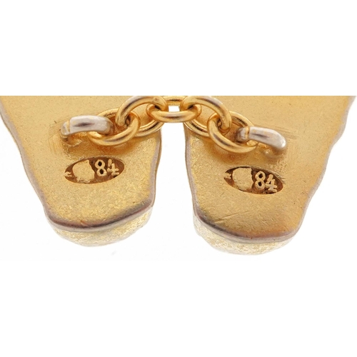 389 - A pair of silver gilt French Bulldog design cufflinks  with ruby eyes, impressed Russian marks, 2.5c... 