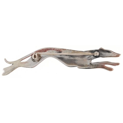 615 - A sterling silver brooch in the form of a Greyhound, 6.5cm wide, 8.3g.