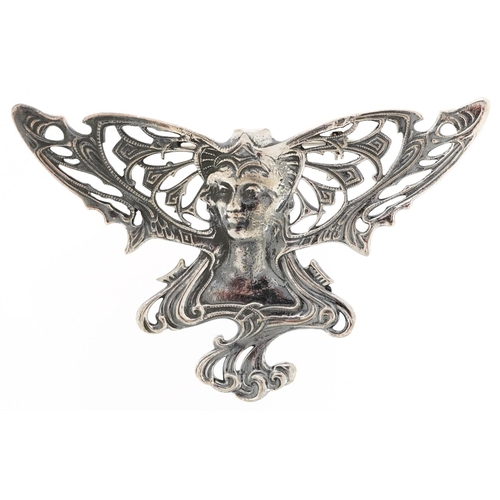 443 - An Art Nouveau style sterling silver maiden head brooch, 7cm wide, 15.8g.