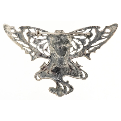 443 - An Art Nouveau style sterling silver maiden head brooch, 7cm wide, 15.8g.