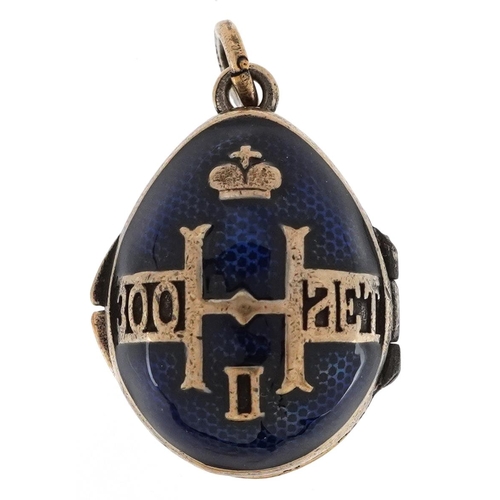 609 - A silver and blue guilloche enamel egg locket, impressed Russian marks, 2.4cm high, 11.7g.