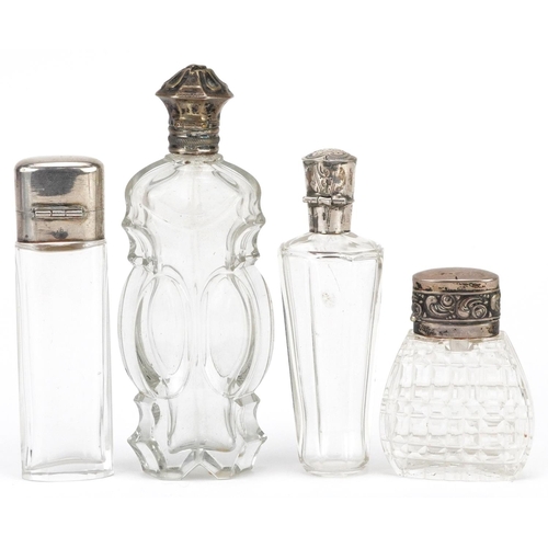 665 - Four Dutch silver mounted glass scent bottles, the largest 11cm high.