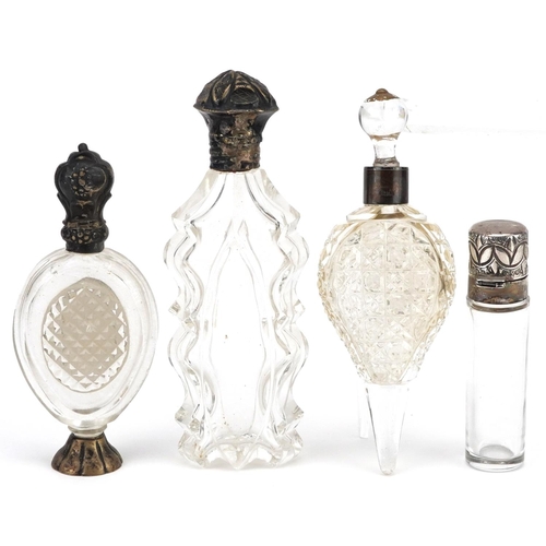 648 - Four antique and later silver mounted glass scent bottles, including two Dutch, the largest 12cm hig... 