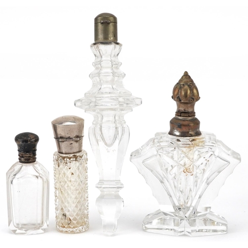 688 - Four antique and later silver mounted glass scent bottles, some Dutch, the largest 15cm high.