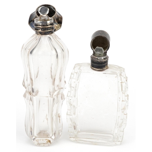 653 - Four antique and later silver mounted glass scent bottles, some Dutch, the largest 11cm high.