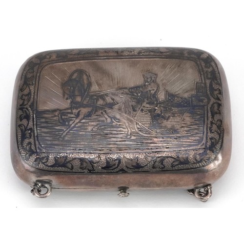 660 - A silver niello work hinged box and cover on chain engraved with a farmer and workhorse, 7cm wide, 3... 