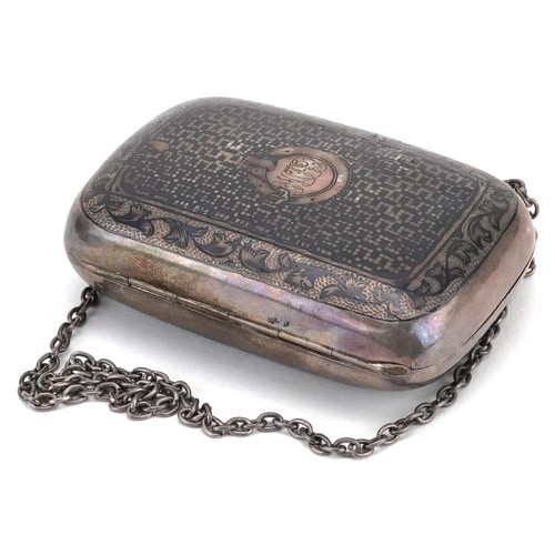 660 - A silver niello work hinged box and cover on chain engraved with a farmer and workhorse, 7cm wide, 3... 