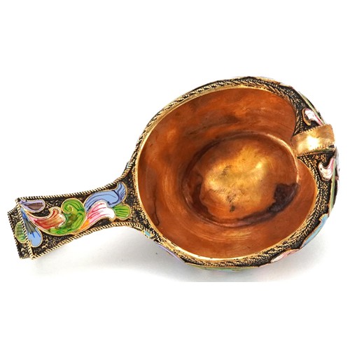 691 - A silver gilt and champlevé enamel pap boat, impressed Russian marks, 7.5cm in length, 48.7g.