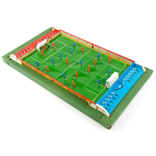 541 - A Chad Valley soccer game, the metal pitch with plastic moveable figures, 59cm in length, boxed.