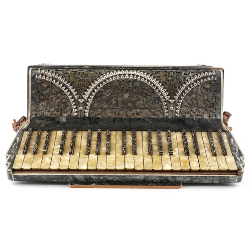 459 - A Settimio Soprani piano accordion, early 20th century, within a green marbled case, 53cm wide.