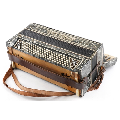 459 - A Settimio Soprani piano accordion, early 20th century, within a green marbled case, 53cm wide.