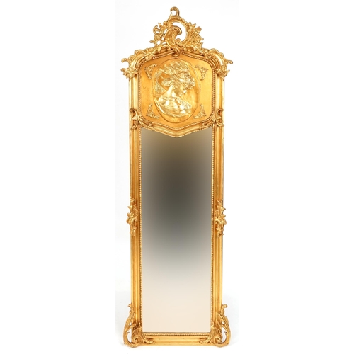 1034 - A modern 18th century style gilded pier mirror, 177cm x 54cm.