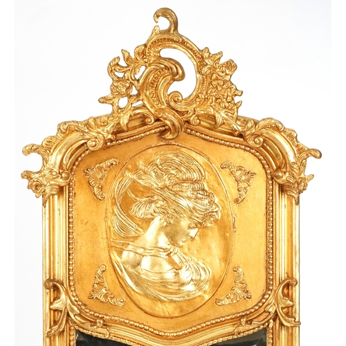 1034 - A modern 18th century style gilded pier mirror, 177cm x 54cm.