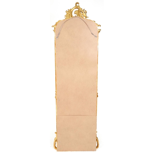 1034 - A modern 18th century style gilded pier mirror, 177cm x 54cm.