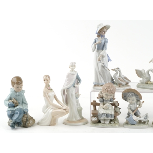 418 - A collection of ten porcelain figures including Nao, The Leonardo Collection and Eve.