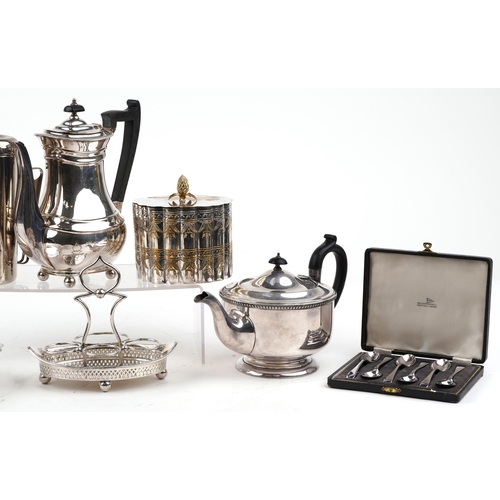 1211 - A small collection of mixed plated items including a Garrard & Co. coffee pot, 23cm high.