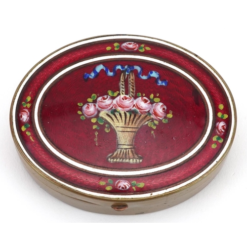 210 - An early 20th century oval brass and enamelled box with floral decoration, W-7cm.