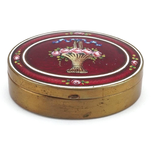 210 - An early 20th century oval brass and enamelled box with floral decoration, W-7cm.