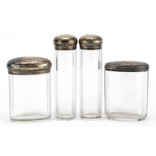 234 - Four silver topped glass dressing table jars, worn marks, H-12cm.