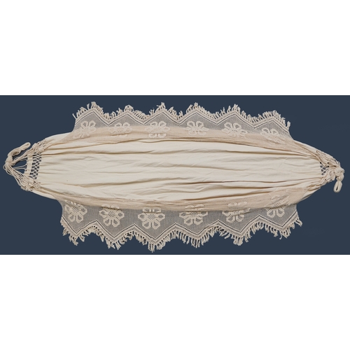 1286 - A late 20th century cotton hammock, with springs.