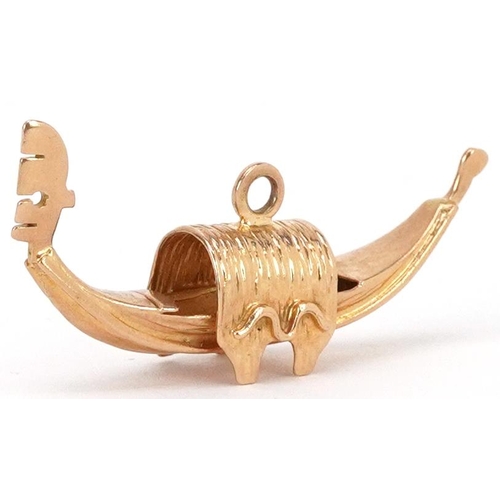 174 - An unmarked gold charm in the form of a gondola, 3.6cm in length, 3.7g.