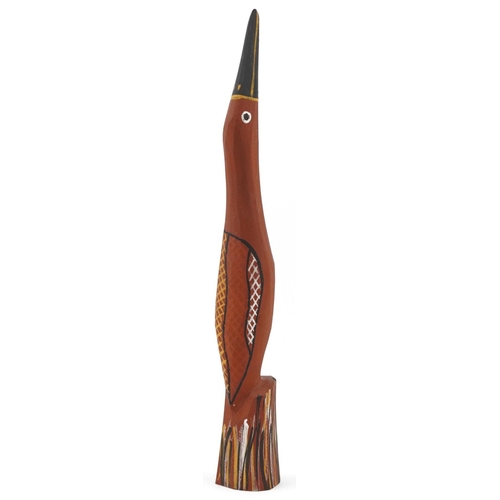 1327 - A late 20th century Australian Aboriginal carved ironwood figure of a bird by Barry Kantilla, 32cm h... 