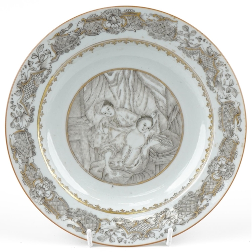 178 - A Chinese porcelain plate hand painted with a male and female in nightwear amongst a floral border, ... 