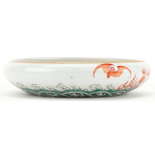 326 - A Chinese porcelain brush washer hand painted with a dragon, bats and crashing waves, 15cm in diamet... 