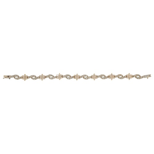 151 - A 14ct two tone gold cubic zirconia bracelet, 18cm in length, 15.8g.