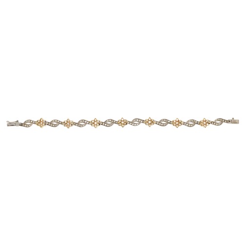 151 - A 14ct two tone gold cubic zirconia bracelet, 18cm in length, 15.8g.