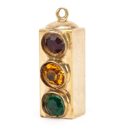 391 - A large 9ct gold charm in the form of a traffic light, 2.7cm high, 4.8g.