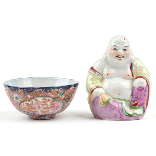 1248 - A Chinese porcelain figure of Buddha, 20th century, together with a small Japanese porcelain bowl an... 