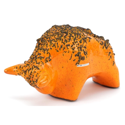 119 - An Otto Keramik West German pottery bull, model number 1010, with orange fat lava glaze, 23cm in len... 