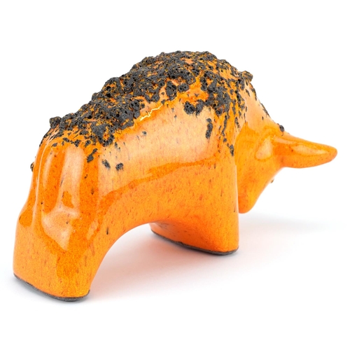 119 - An Otto Keramik West German pottery bull, model number 1010, with orange fat lava glaze, 23cm in len... 