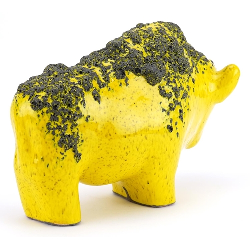 118 - An Otto Keramik West German pottery bull, model number 1012, with yellow fat lava glaze, 32cm in len... 