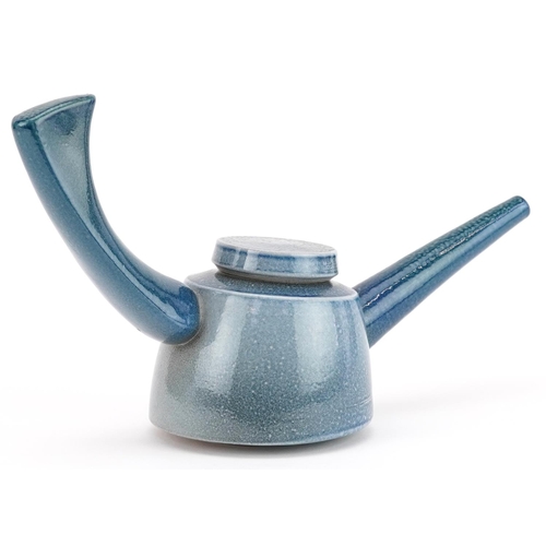 30 - A mid 20th century salt glazed studio pottery teapot by Jeremy Nichols, 28cm in length.